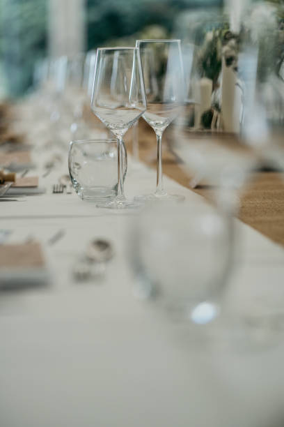 istock Rustic Garden Wedding Table Setting with Wine Glasses and Floral Details 2185567241