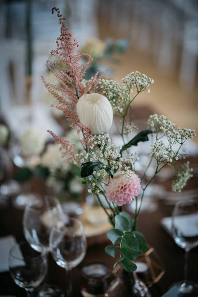 istock Elegant Wedding Table Setting with Delicate Floral Arrangements and Wine Glasses 2185568184