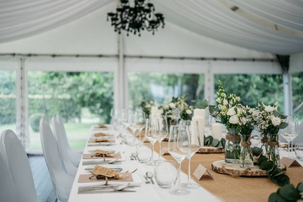 istock Elegant Wedding Table Setting in White Marquee with Rustic Details 2185569027