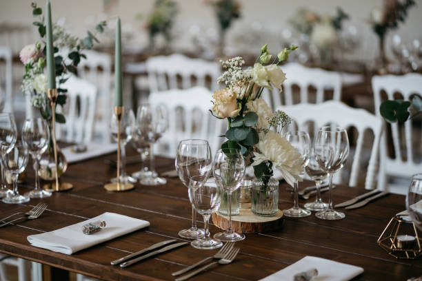 istock Elegant Wedding Table Setting with Wine Glasses and Floral Decorations 2185569075