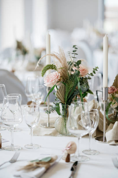 istock Elegant Wedding Table Setting with Boho Floral Centerpiece 2185569141