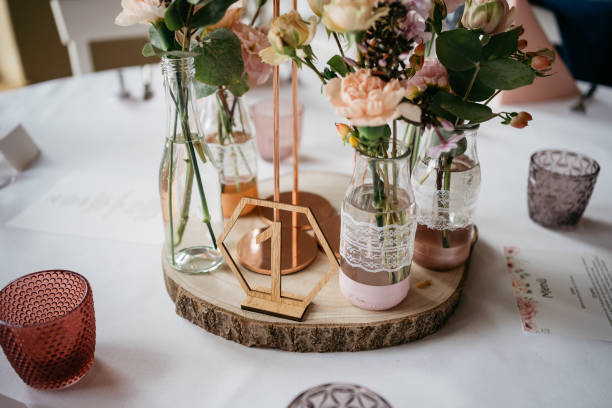 istock Rustic Wedding Table Centerpiece with Geometric Details and Blush Flowers 2185569759