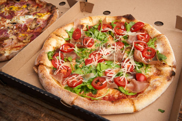 istock Whole pizza in a cardboard 2185570550