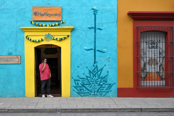 Oaxaca , Mexico - July 11, 2023: Unknown people in colorful street in Oaxaca, Mexico. Oaxaca de Juarez the capital and largest city of the eponymous Mexican state of Oaxaca