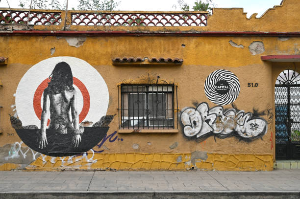 Berlin, Germany - May 23, 2014: Urban grunge and Street Art Painting in Berlin Kreuzberg by Artist Blu.