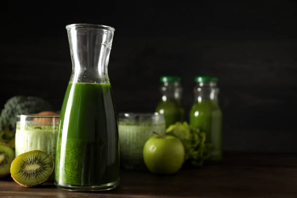 istock Smoothie from fresh vegetables on a dark background 2185573516