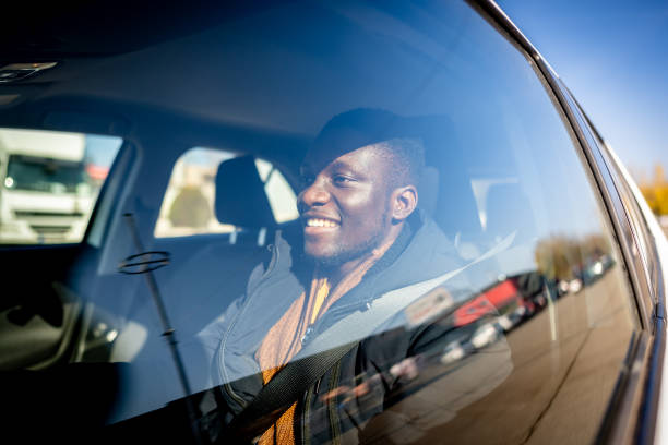 istock African-American male driver driving a car 2185574728