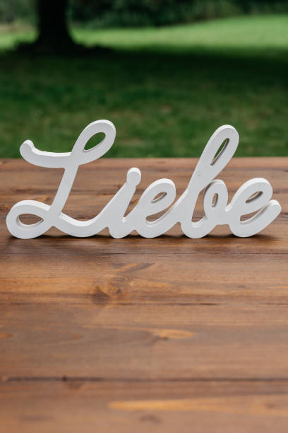 istock White Wooden Liebe Sign with Eucalyptus Wedding Decoration 2185578588