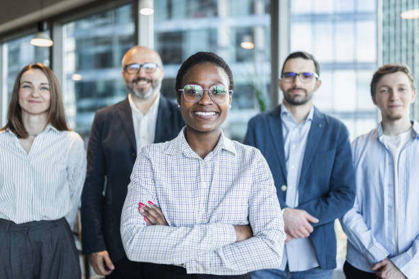 istock Confident Business Team Standing Together in Office Environment 2185579940