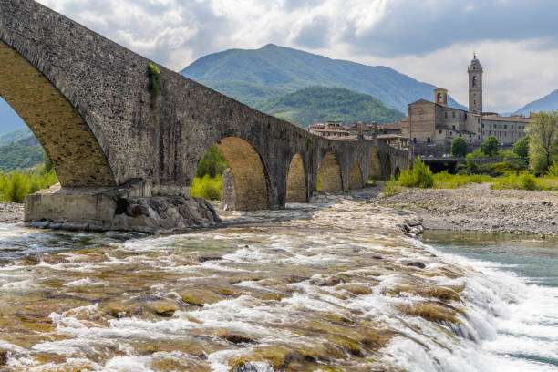 istock Gobbo Bridge also Devil Bridge or Ponte del Diavolo or Ponte Gobbo in Bobbio, Piacenza province, Trebbia Valley, Emilia Romagna, Italy 2185583852