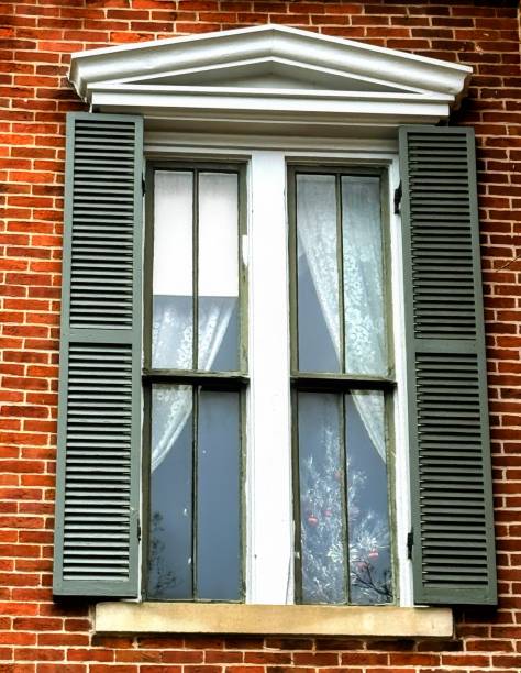 A view of Hamilton, Bermuda ... shutters on a blue building.