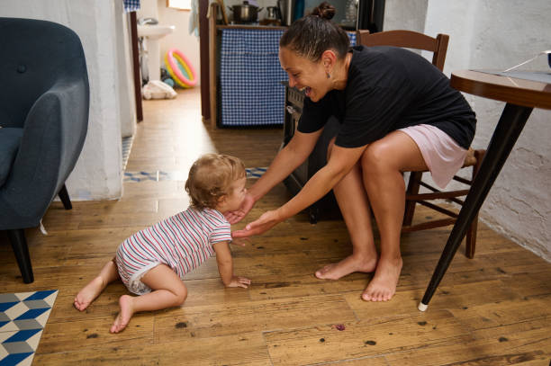 istock Mother and baby bonding in a cozy home setting 2185584402
