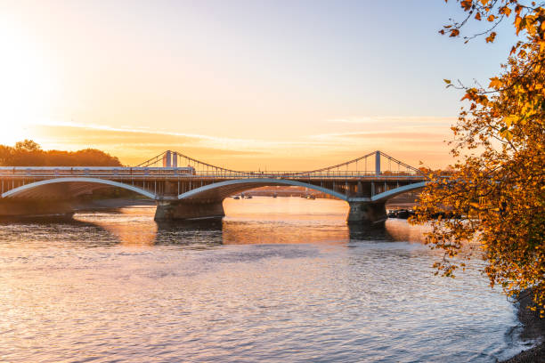 Grosvenor Bridge and river Thames in London at sunset