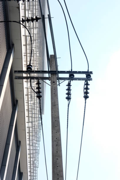istock new building and electric line 2185586046