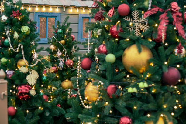 istock tree decorated with toys and garlands 2185594735