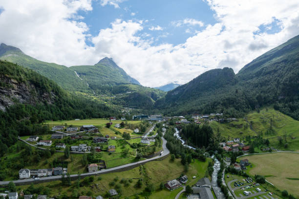 istock Geiranger surrounded by majestic green mountains 2185600100