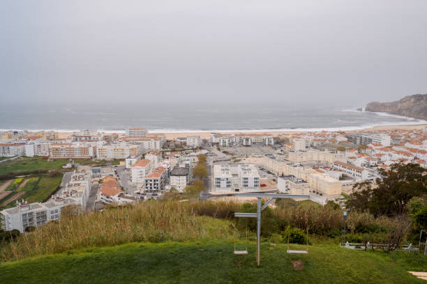 istock Swing set overlooking nazare north beach, portugal 2185601976