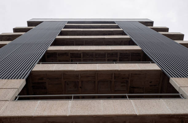 istock Modern concrete parking garage with metal cladding viewed from below 2185602029