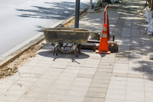 Reparing works on sidewalk of Phahonyothin Road alongside Chatuchak Park in Bangkok