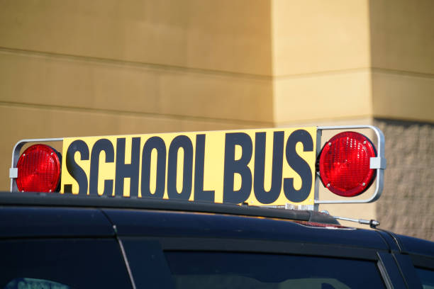 Close up on school bus sign