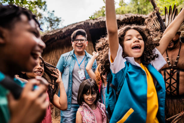 istock Children having fun during a field trip to an indigenous village 2185608617