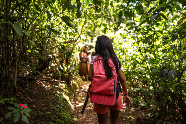 istock Child girl doing hike during a field trip in a summer camp 2185608732