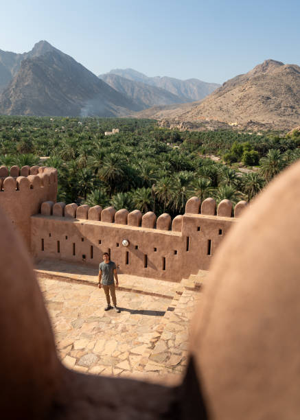 istock Man Exploring Nakhal Fort, Oman 2185612050