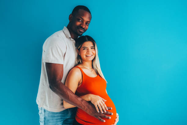 Pregnant young woman  enjoys support from her husband
