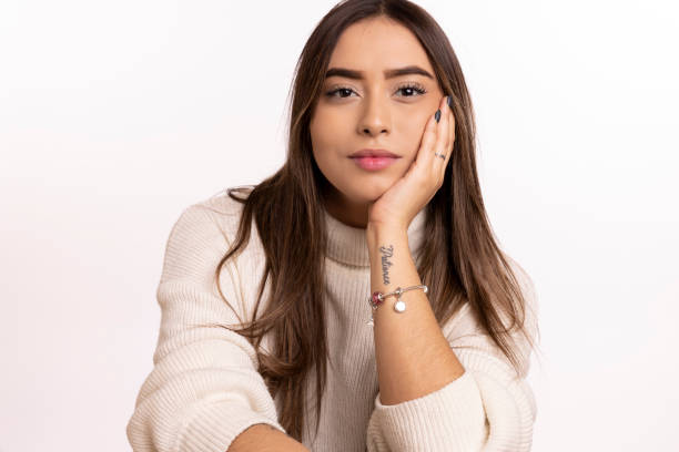 istock Hispanic woman close up smiling into camera 2185616614