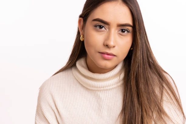istock Hispanic woman close up smiling into camera 2185616627