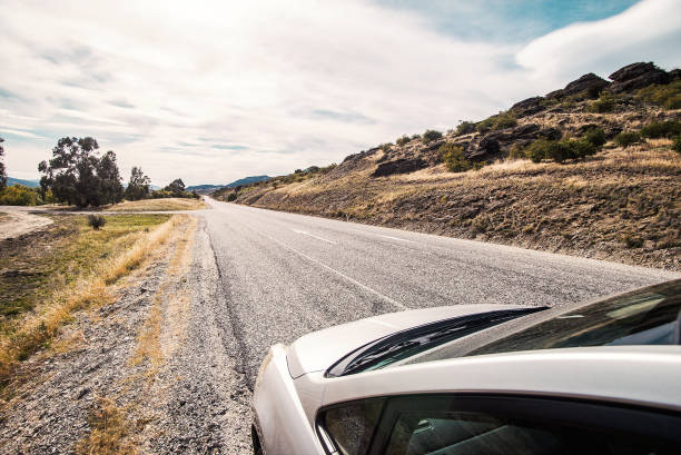 istock Car ride on road in sunny weather 2185618178