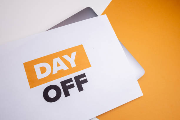 istock Day off - workplace message in the office. Concept of absence from work and day off 2185620114