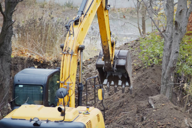 istock Heavy machinery in action during the initial stage of construction. 2185620615