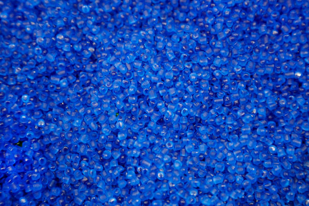 A mass of pellet material for injection molding.