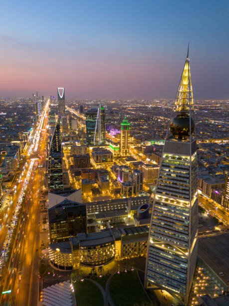 istock Al Faisaliah Tower pyramid-shaped commercial skyscraper. Riyadh. Drone shot flying. Sunset. Evening. 2185622229