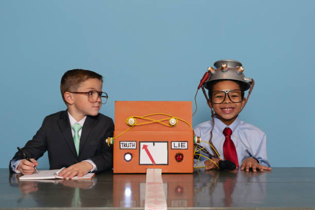 istock Boys with Homemade Lie Detector Machine 2185622276