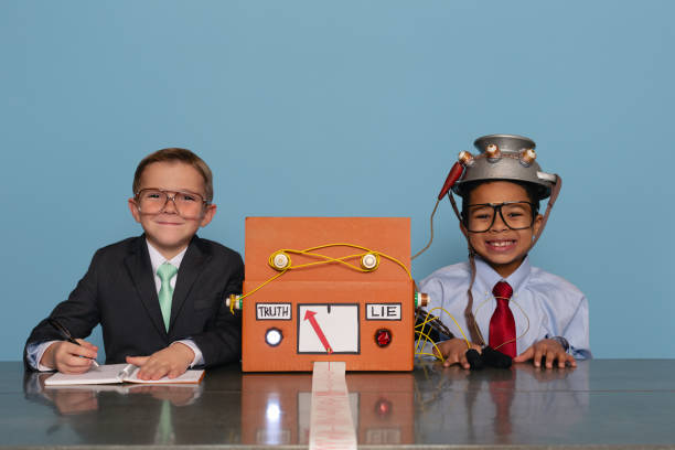 istock Boys with Homemade Lie Detector Machine 2185622282