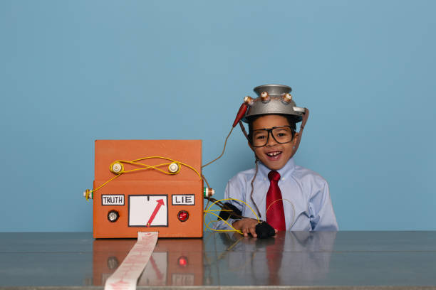 istock Boy with Homemade Lie Detector Machine 2185622286