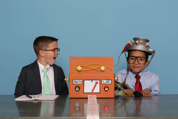 istock Boys with Homemade Lie Detector Machine 2185622294