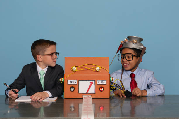 istock Boys with Homemade Lie Detector Machine 2185622298