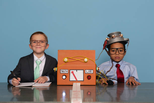 istock Boys with Homemade Lie Detector Machine 2185622302