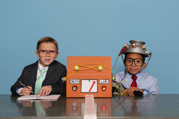 istock Boys with Homemade Lie Detector Machine 2185622304