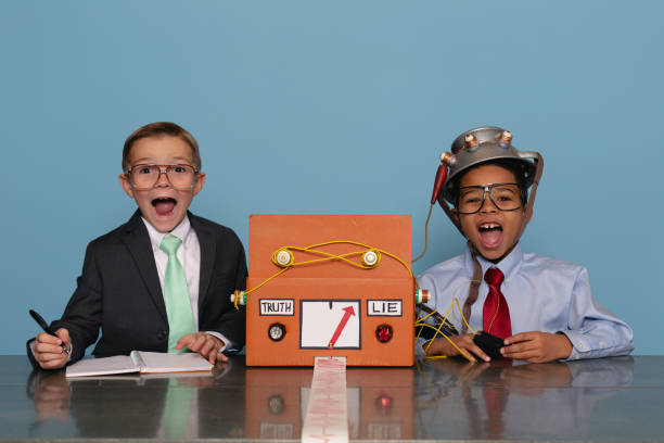 istock Boys with Homemade Lie Detector Machine 2185622305