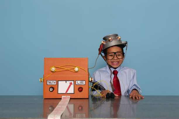 istock Boy with Homemade Lie Detector Machine 2185622308