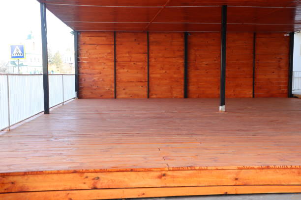 istock An Empty Wooden Stage Featuring a Rustic Finish, Perfect for Various Events and Gatherings 2185622367