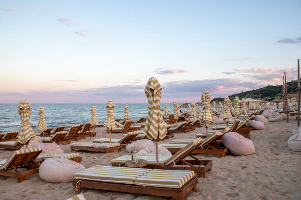 istock Chaise lounges and umbrellas 2185622406