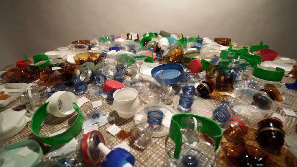 istock Single use plastic garbage from one household. Bring awareness to over pollution of landfill by non recyclable plastic waste. Toxic non biodegradable garbage on the table. Environmental issues. 2185622964
