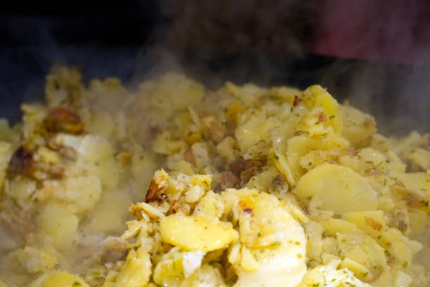 detail of tyrol roasted potatoes being cooked in Austria
