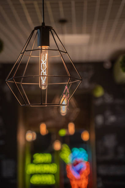 istock Light bulbs in retro style. Edison's lamps in the interior 2185625025