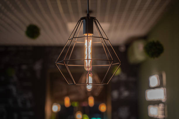 istock Light bulbs in retro style. Edison's lamps in the interior 2185625055